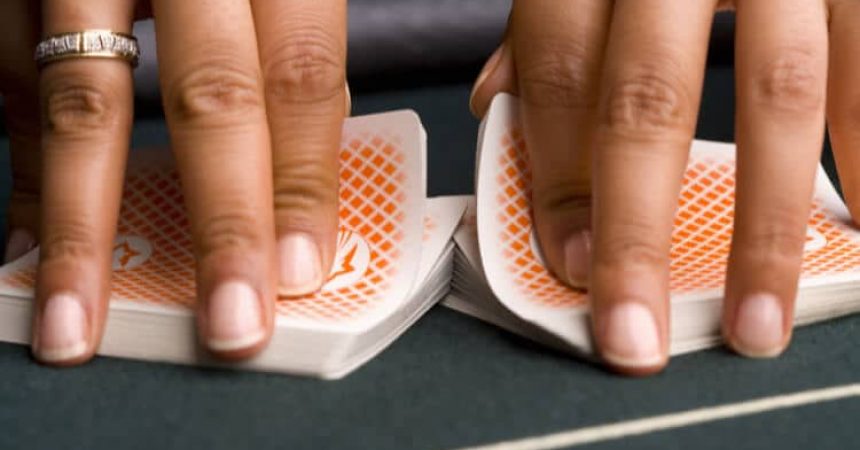 hands shuffling cards